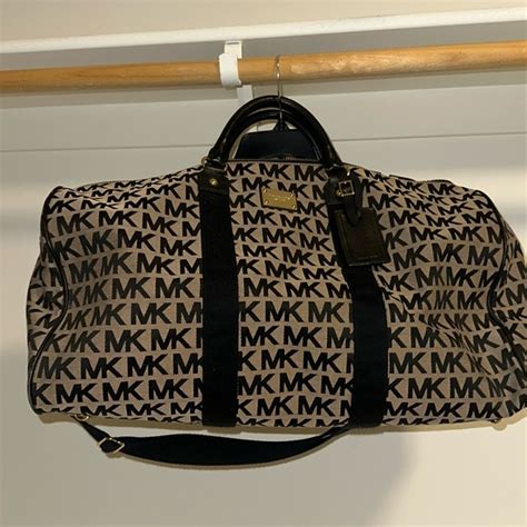 michael kors free duffle bag|Michael Kors duffle bag sale.